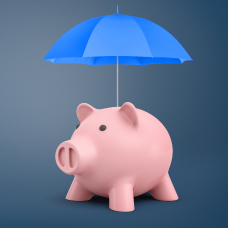 Pink piggy bank with blue umbrella over it