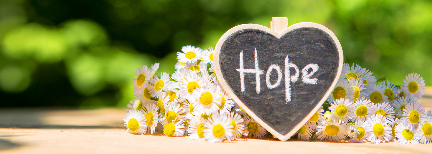Hope Sign with Flowers Hero Image