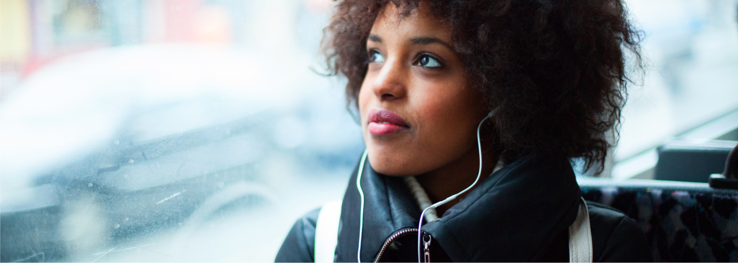 woman listening to podcasts image