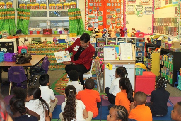 Wichita Capitol Federal Employee Teketa Harding Reading to Children