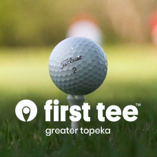 Golf ball and tee with First Tee Greater Topeka logo