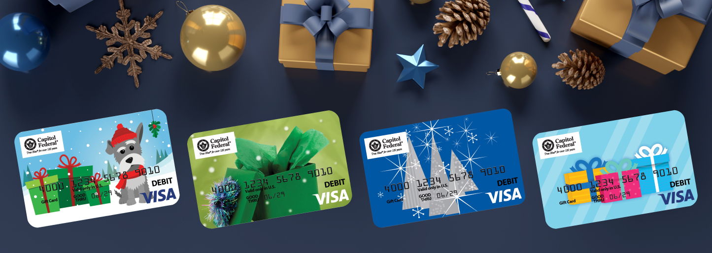 various visa cards with presents wrapped around the border