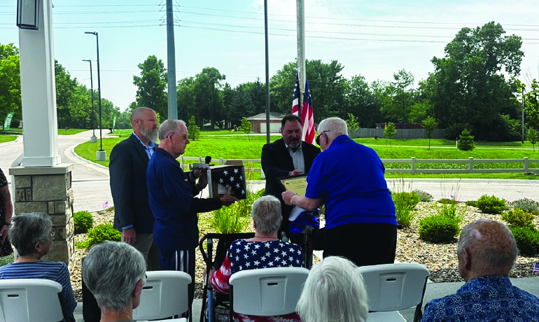 Cedarhurst of Topeka flag presentation.