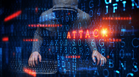 Cybersecurity code and hacker in front of computer