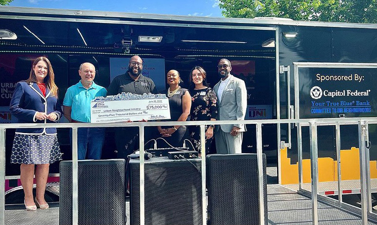 Check presentation for housing donation.