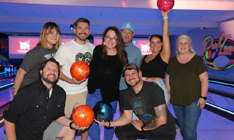 Volunteers bowling.