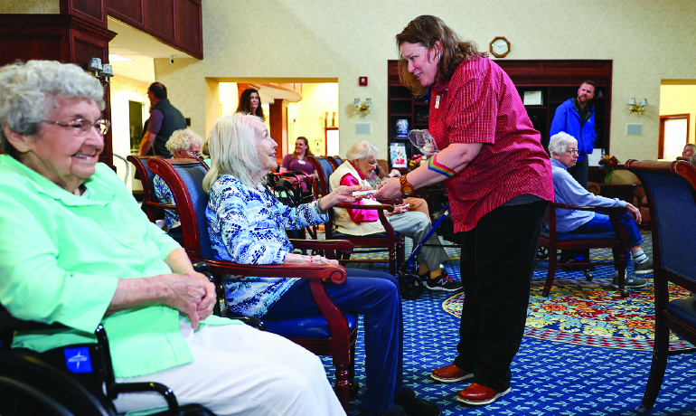Pioneer Ridge Assisted Living and Health Care flag presentation.