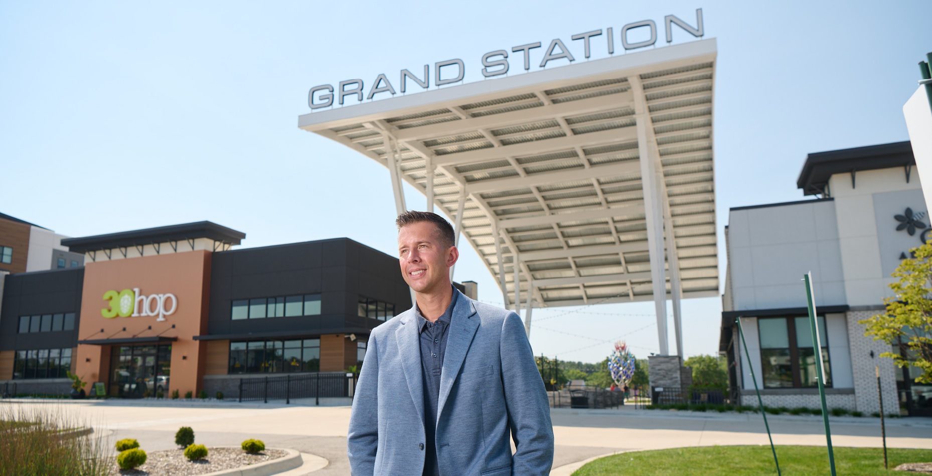 Matt Pennington standing in front of newest development. 