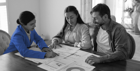 Financial advisor talking to clients.