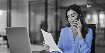 Private banker talking on phone.