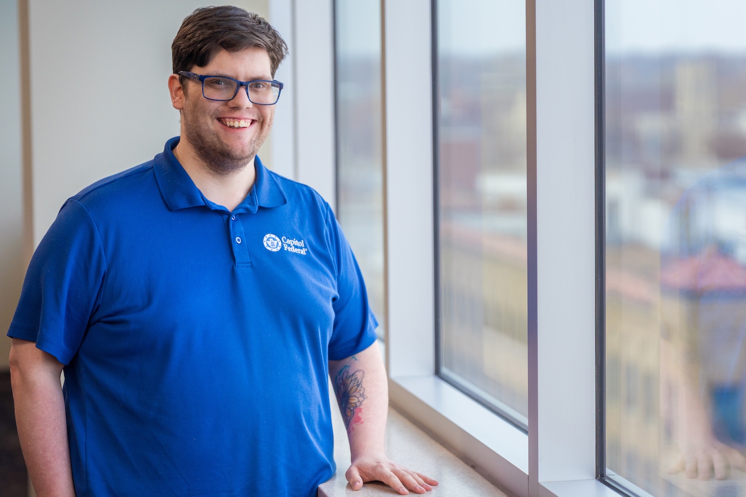 Cody-Bell-standing-next-to-window.jpg Cody-Bell-standing-next-to-window