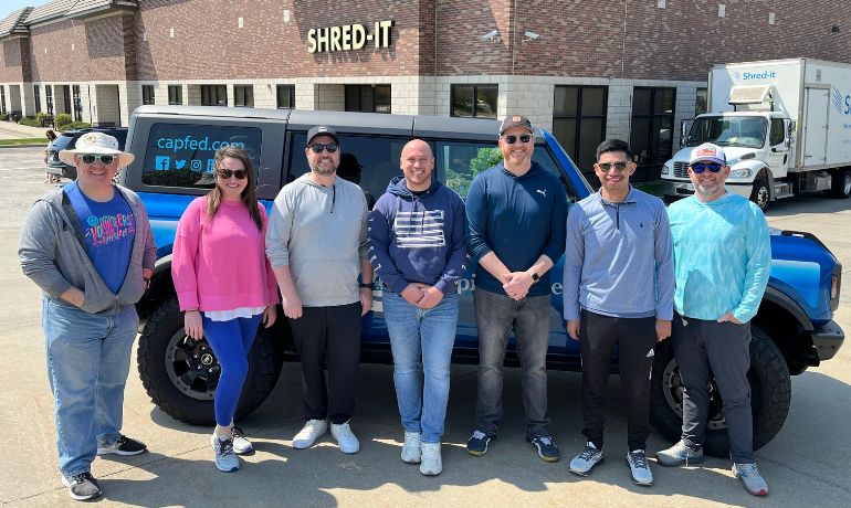 Volunteers-in-front-of-Bronco.jpg